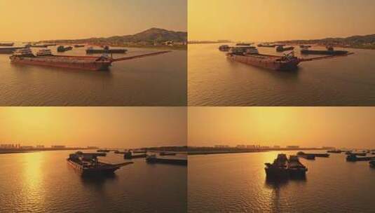 夕阳下的江面船舶船只高清在线视频素材下载