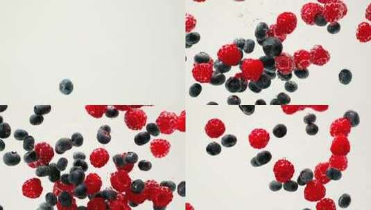 蓝莓树莓浆果掉入水中特写高清在线视频素材下载