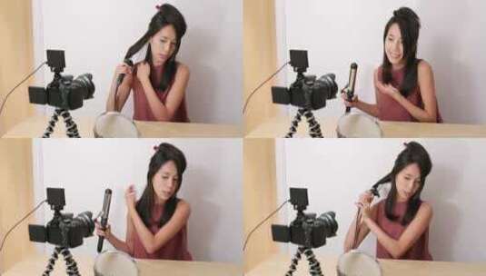 女人在家为美容产品拍摄视频高清在线视频素材下载