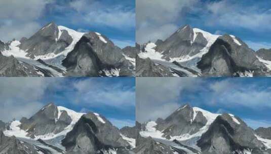 航拍四川甘孜党岭山脉主峰夏羌拉雪山风光高清在线视频素材下载