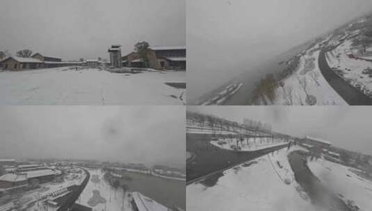 穿越机航拍北湖湿地公园雪景下雪古风建筑高清在线视频素材下载