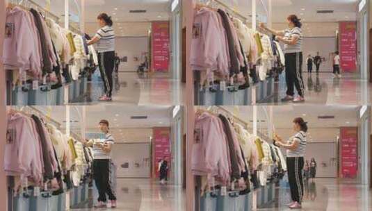 商场服装店员整理衣服高清在线视频素材下载