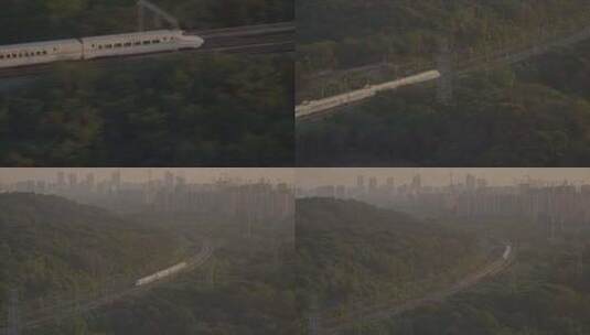 一列和谐号动车在南京紫金山森林中穿梭飞驰高清在线视频素材下载