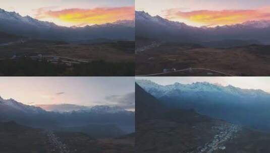 西藏吉隆镇乃夏村日出航拍雪山村庄风景高清在线视频素材下载