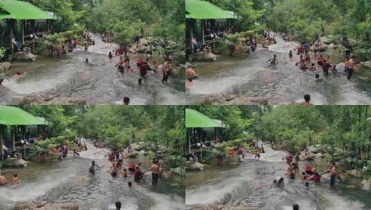 人们在雨林河洗澡高清在线视频素材下载