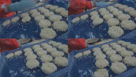 海参加工生产线工人在流水线上处理海鲜制品高清在线视频素材下载