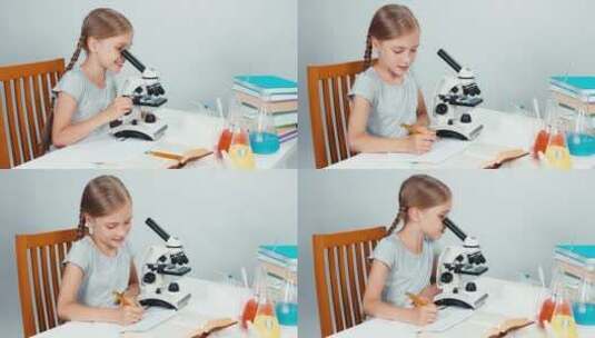 使用显微镜的女孩高清在线视频素材下载