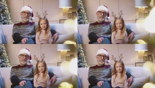 戴圣诞帽的祖孙高清在线视频素材下载