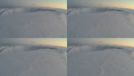 航拍的冬季雪山景观高清在线视频素材下载