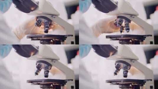 科学家观察显微镜高清在线视频素材下载