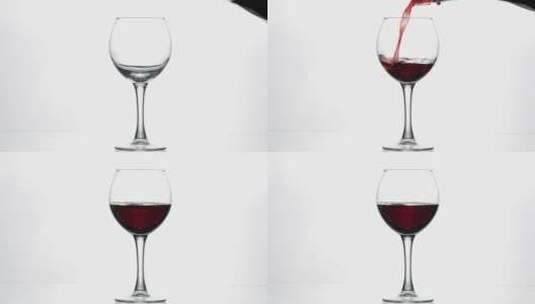 一大杯红酒被倒进玻璃杯里高清在线视频素材下载