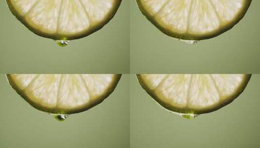 青柠檬片上滴水的慢镜头特写高清在线视频素材下载