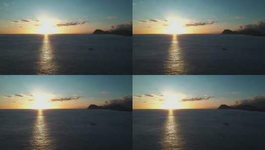 落日夕阳海面倒影帆船行驶唯美航拍高清在线视频素材下载