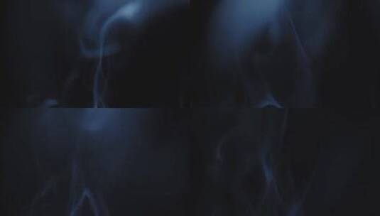 黑色背景下的蓝色烟雾高清在线视频素材下载