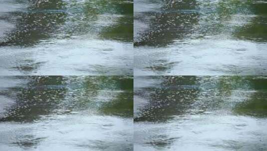 沥青路面上雨的特写镜头高清在线视频素材下载