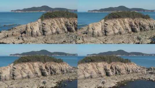 航拍横移平视三连岛外侧的刘公岛高清在线视频素材下载
