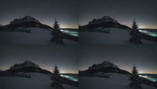 夜空中的星星在冬季翻越山峰天文学时间流逝高清在线视频素材下载