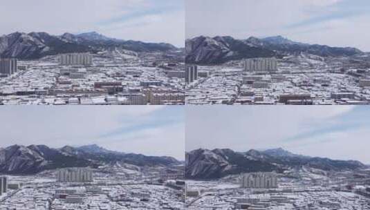 航拍白雪覆盖的小城镇高清在线视频素材下载