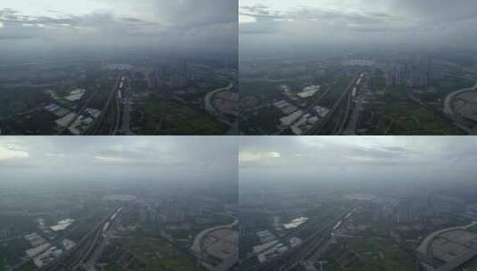 广州番禺南站蓝天白云交通枢纽航拍穿过云层高清在线视频素材下载