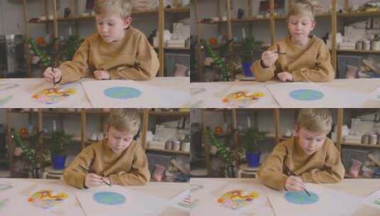 在纸上画地球的孩子高清在线视频素材下载