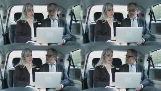 合作伙伴在商务汽车上讨论工作高清在线视频素材下载
