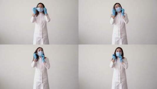 戴上医用口罩做OK手势的女医生高清在线视频素材下载