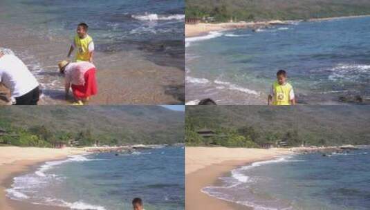 海滩家人亲子嬉戏海浪高清在线视频素材下载