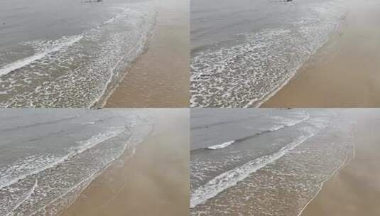 阴天大海沙滩海水波纹海浪航拍海滩浪花波浪高清在线视频素材下载