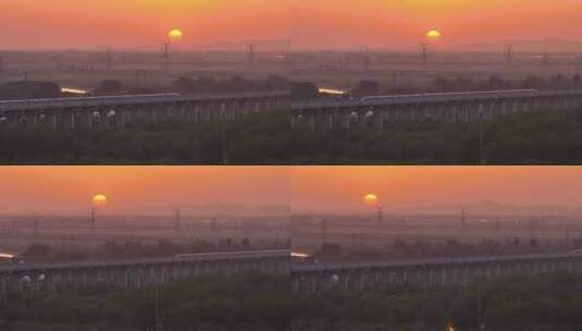 日落夕阳下飞驰的高铁动车高清在线视频素材下载
