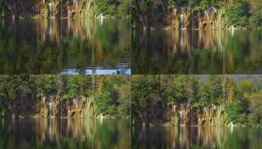 森林瀑布湖水倒影绿树水面波浪高清在线视频素材下载
