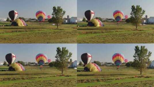 热气球降落在草地上高清在线视频素材下载