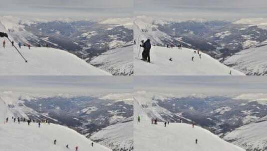 滑雪者的时间流逝，在法国阿尔卑斯山的斜坡/滑雪道上滑雪，后面是白雪皑皑的山谷。高清在线视频素材下载