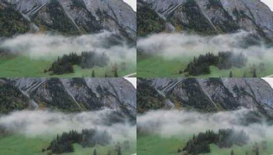 高原山脚下的云雾高清在线视频素材下载