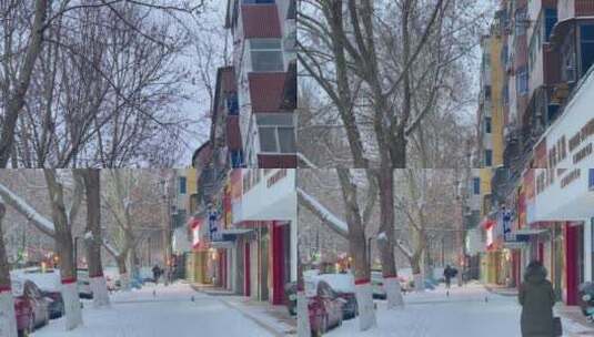 城市老小区下摇下雪街头结冰路面行人高清在线视频素材下载