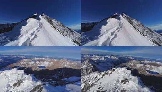 攀登四川岷山山脉主峰雪宝顶雪峰的登山队高清在线视频素材下载