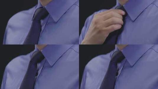 穿蓝色衬衣的男人整理领带高清在线视频素材下载