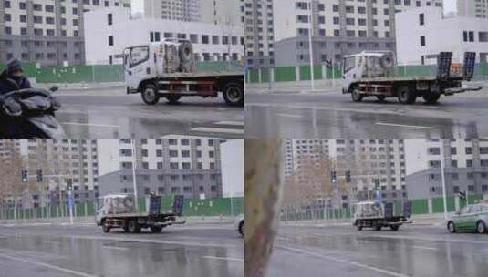 泥泞湿滑道路上行驶的路障拖车清障车高清在线视频素材下载