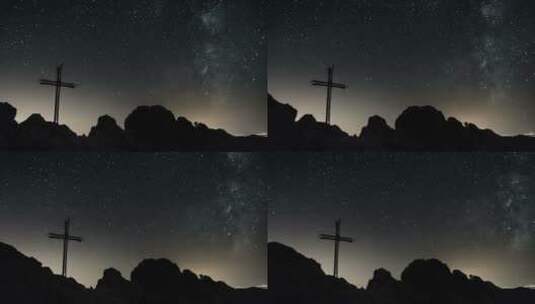 夜晚的星空和山顶十字架高清在线视频素材下载