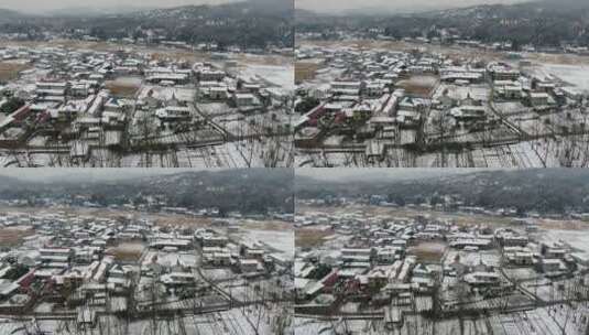 航拍南方丘陵山川森林美丽乡村雪景高清在线视频素材下载