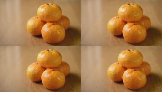 橘子金字塔。橘子皮掉在桌子上高清在线视频素材下载