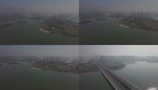 晨雾中的濮阳音乐桥龙湖高清在线视频素材下载