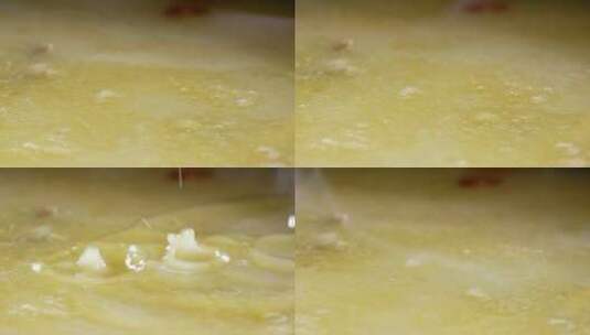鸡汤滴落诱人黄金色高速升格镜头高清在线视频素材下载