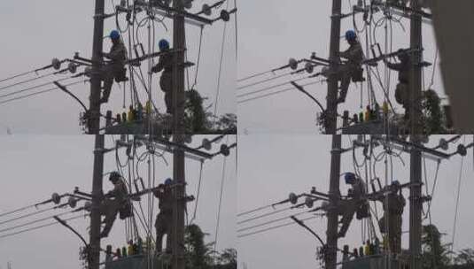 电工电线杆抢修电路修理工雨天安装电线电路高清在线视频素材下载