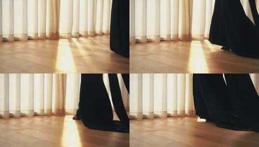 房间室内女人穿黑色裙子高跟鞋走路黑色长裙高清在线视频素材下载