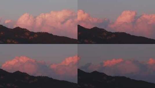 山上粉红色的云朵云卷云舒高清在线视频素材下载