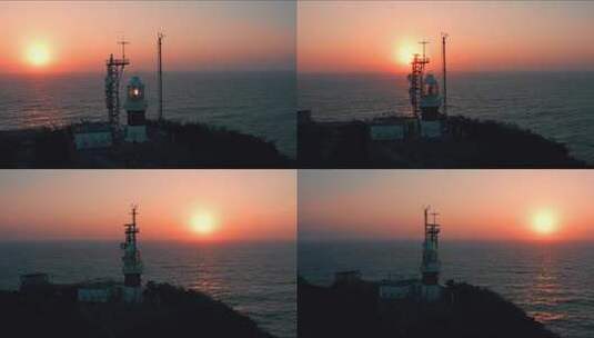 海上夕阳灯塔4K高清在线视频素材下载