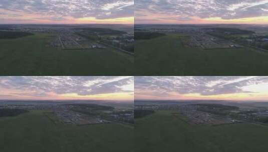 日落时小屋村庄领土的鸟瞰图18高清在线视频素材下载