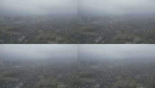 雨季迷雾中的城市航拍高清在线视频素材下载