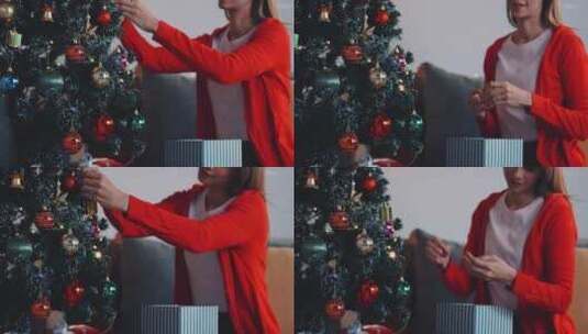 一个漂亮的女人正在家里为圣诞晚会装饰一棵松树。高清在线视频素材下载