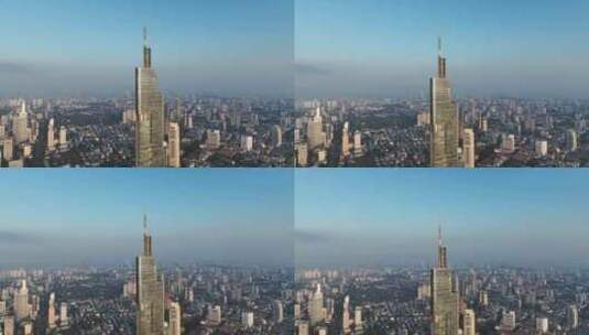 清晨时分的江苏南京紫峰大厦近景航拍高清在线视频素材下载